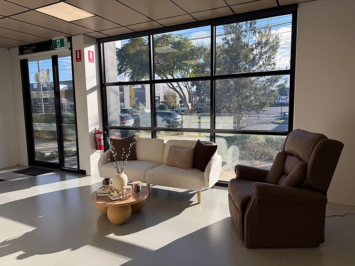 A warm lounge setting with a comfortable recliner chair